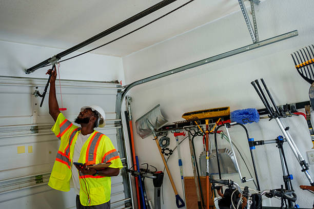 Professional Garage Door Panel Replacement technician working in Mill City, OR